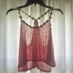 Pink tank top with daisy straps
